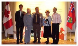 photo of board members receiving awards links to photo gallery