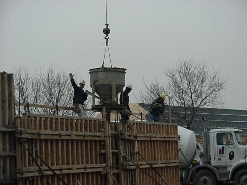 57-WorkersPouringCement-03-03-04