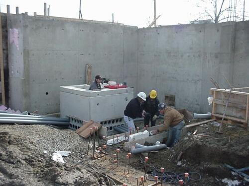 64-ManInConcreteBox-03-11-04