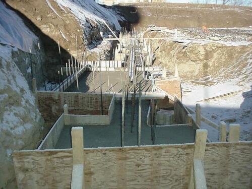 30-PouredCementInFramesWestSide-12-13-03